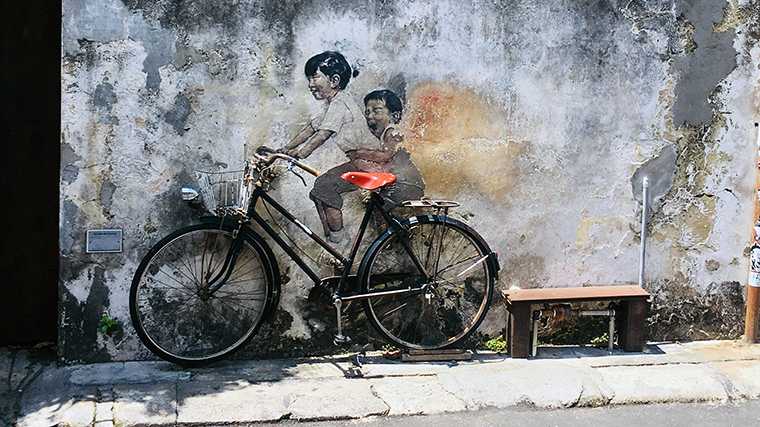 Een van de vele muurschilderingen in de wijk rond Armenian Street in George Town, Penang.